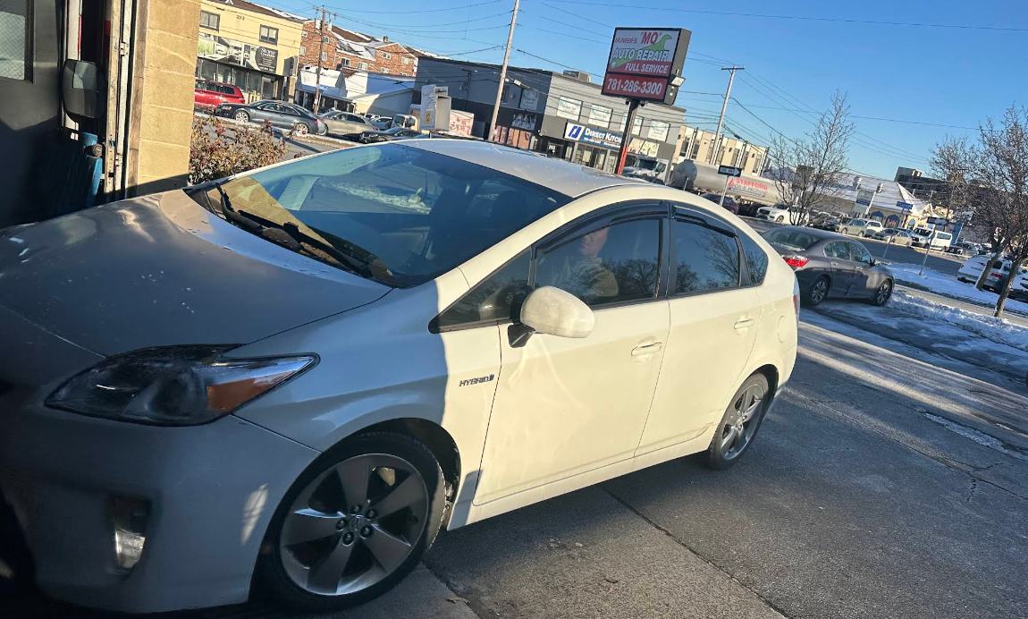 Toyota Prius mid-way through a tint install